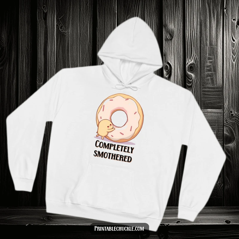 Funny hoodie depicting a shy donut attempting to hug a large, smiling doughnut hole, designed for cozy comfort.