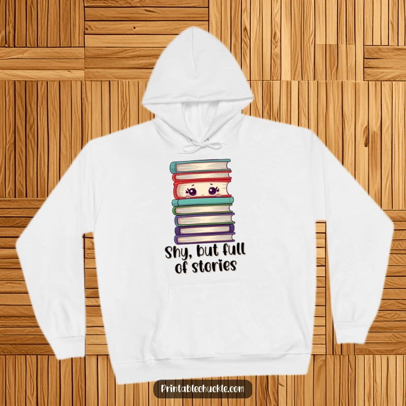 Funny hoodie depicting a bashful book hiding behind a large stack, its eyes peeking out with sweet shyness.