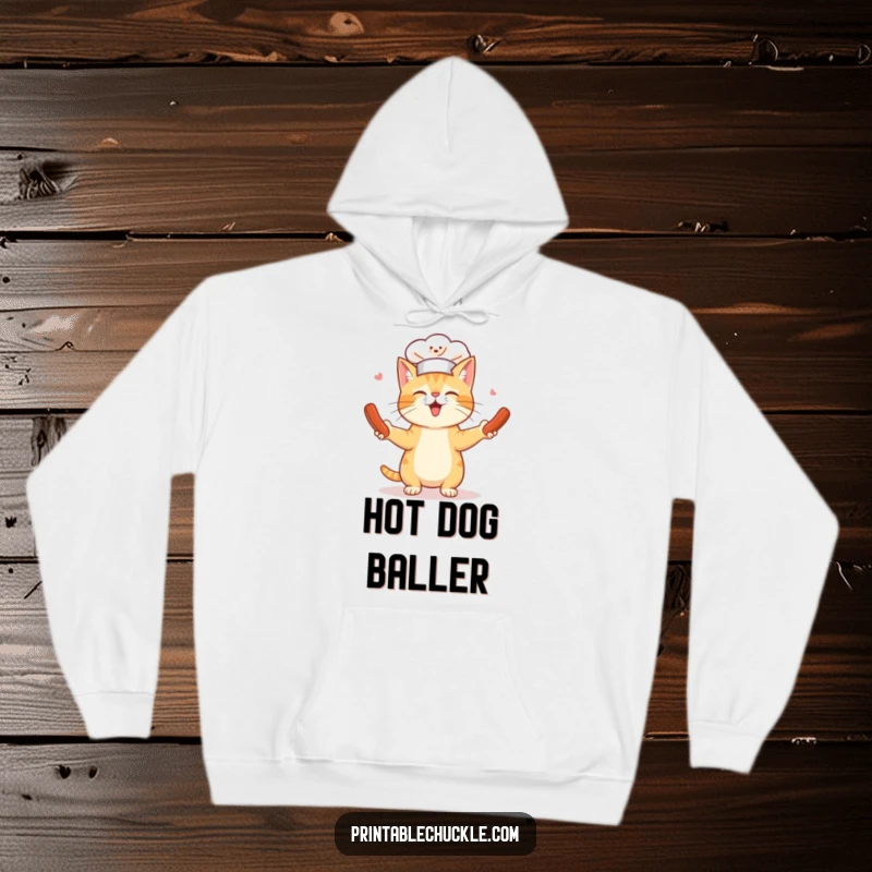 Funny hoodie showing a cat wearing a tiny chef hat hilariously juggling spinning hot dogs, perfect for cozy, cute, and culinary humor.
