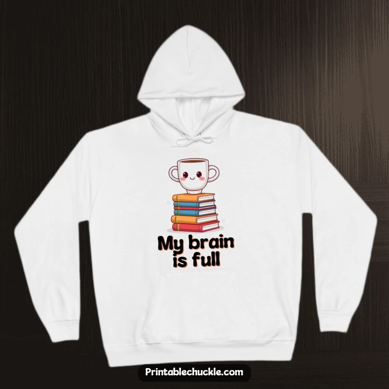 Funny hoodie depicting a smiling coffee cup precariously balancing on a wobbly stack of books, offering cozy humor for readers.
