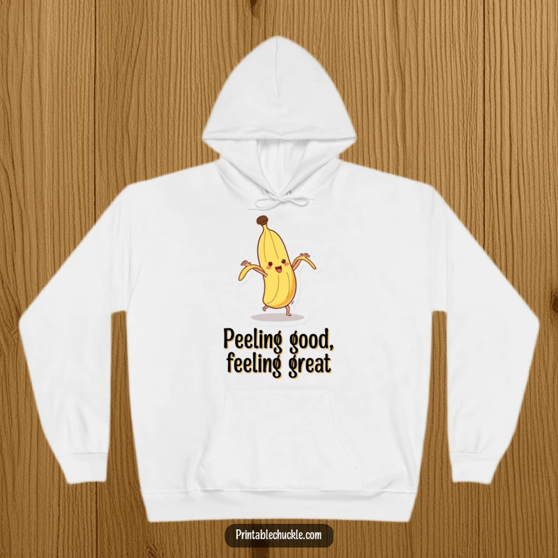 Funny dancing banana hoodie, depicted mid-spin attempting its own hilarious self-peel, offering warmth and amusement.