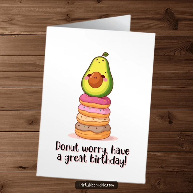 Funny free printable birthday card: determined avocado precariously balancing on a towering stack of colorful donuts.