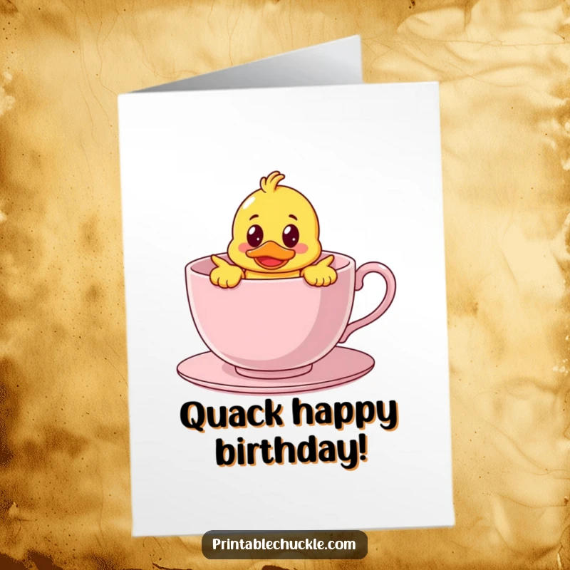Funny free printable birthday card showing a bewildered rubber duck character stuck inside a giant teacup, a comical birthday surprise.