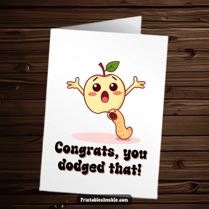 Funny free printable congratulations card showing an apple with arms out, surprised by a falling worm.