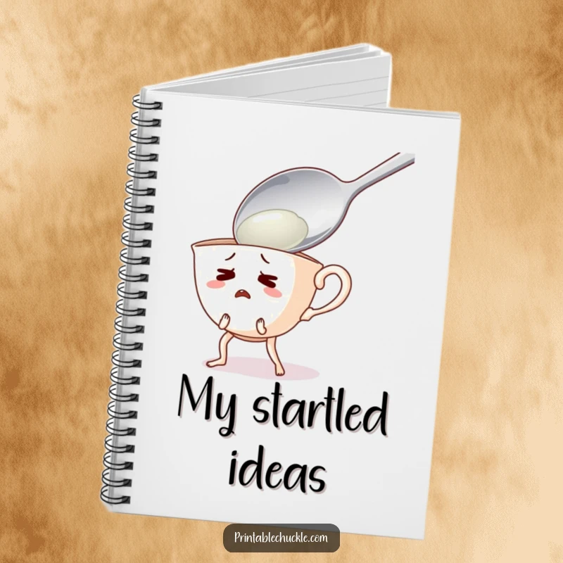 Funny notebook with a startled teacup character recoiling from a giant spoon, perfect for humorous notes.